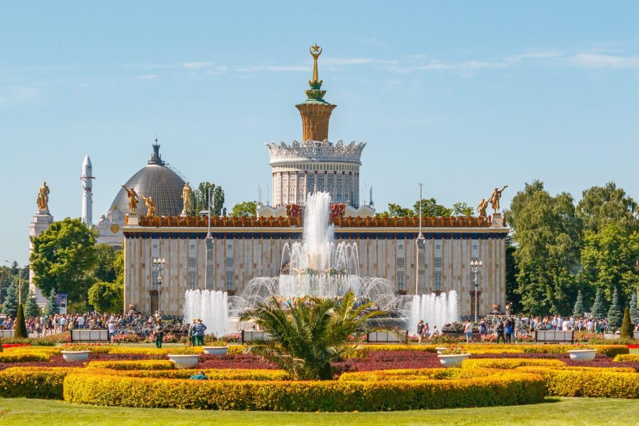 MOSCOW, RUSSIA - JUNE 17, 2021: Fountain in VDNKh park in Moscow. Sunny view of the Soviet architecture, landmark of Moscow. Famous touristic place