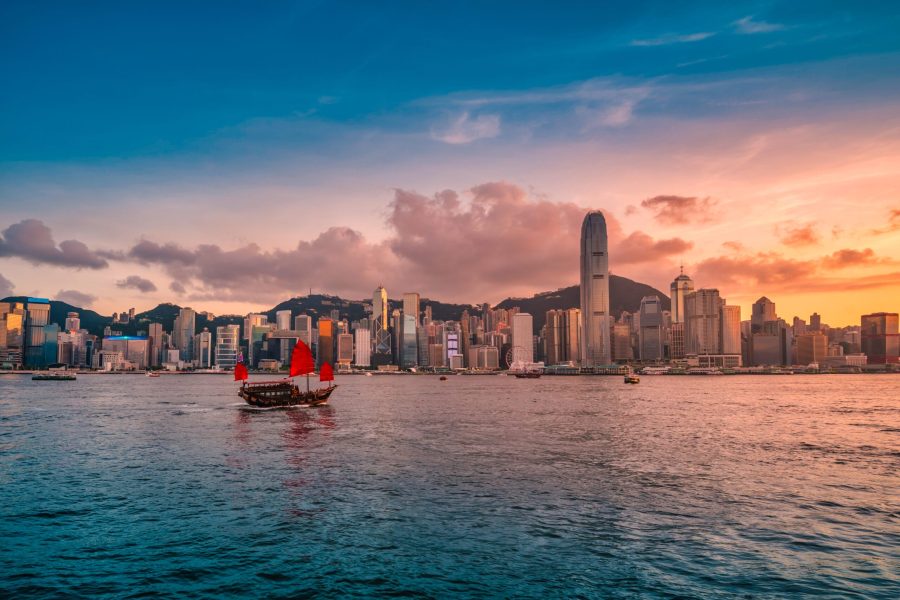 Skyline Hong Kong city at sunset view from harbor in Hong Kong.